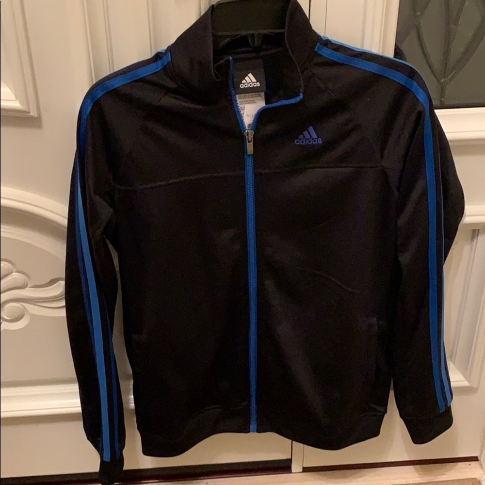 Adidas size large for kids. Never used!